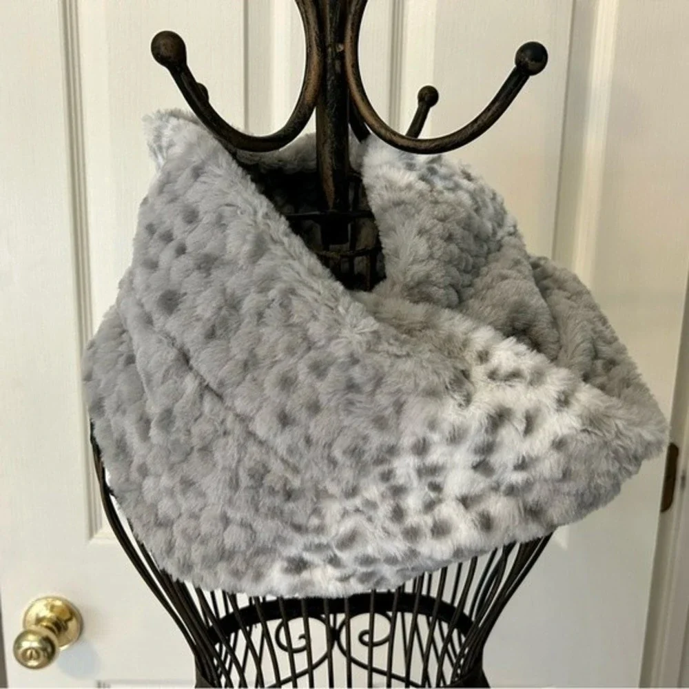 Faux fur infinity neck scarf for winter warmth. Gray and cream with animal spots